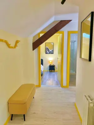 Coin salon dans l'établissement Yellow Suite - Design Stay for 3 - Alsace - Vosges