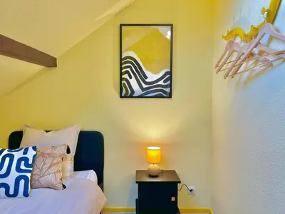 Un ou plusieurs lits dans un hébergement de l'établissement Yellow Suite - Design Stay for 3 - Alsace - Vosges