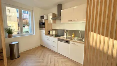 Cuisine ou kitchenette dans l'établissement T2 design terrasse, Climatisé, Netflix