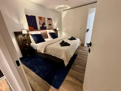 Un ou plusieurs lits dans un hébergement de l'établissement Appartement avec garage - 5mn aéroport Bâle