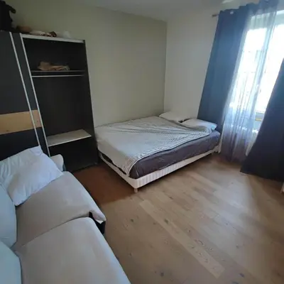 Un ou plusieurs lits dans un hébergement de l'établissement Appartement proche Mulhouse, free parking