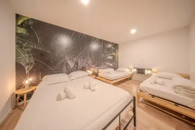 Un ou plusieurs lits dans un hébergement de l'établissement Le Vauban 32 Bel appartement pour 8 personnes en centre-ville