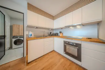 Cuisine ou kitchenette dans l'établissement La Sainte Anne Appartement 4 Pers Hyper Centre