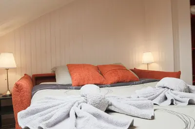 Un ou plusieurs lits dans un hébergement de l'établissement TERRACOTTA Duplex, 8 guest, Garage included