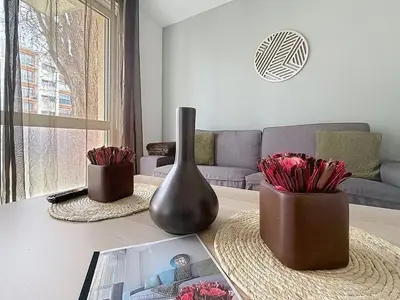 Coin salon dans l'établissement Appartement calme avec 2 chambres parking gratuit
