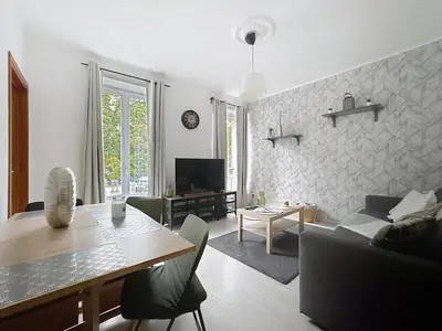 Télévision ou salle de divertissement dans l'établissement Appartement Le Paris jusqu'à 6 voyageurs