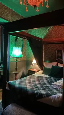 Un ou plusieurs lits dans un hébergement de l'établissement Le Gite du Sorcier ! Appartement magique