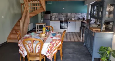 Cuisine ou kitchenette dans l'établissement La Maison De Béatrice