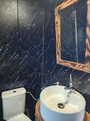 Salle de bains dans l'établissement Le Nid Douillet du Tacot