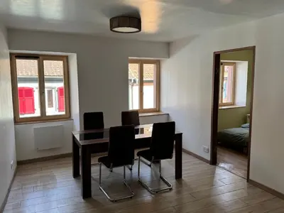 Coin salon dans l'établissement Gîte au clocher vrillé