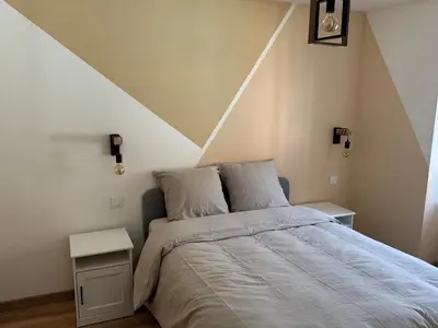 Un ou plusieurs lits dans un hébergement de l'établissement Gîte au clocher vrillé