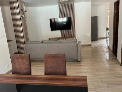 Télévision ou salle de divertissement dans l'établissement Gîte au clocher vrillé