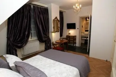 Un ou plusieurs lits dans un hébergement de l'établissement Le BALCON DU PRINCE