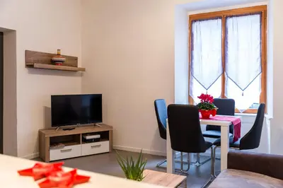 Télévision ou salle de divertissement dans l'établissement Chez Daniel