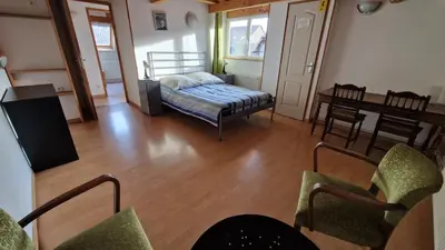 Un ou plusieurs lits dans un hébergement de l'établissement Gîte Eugénie