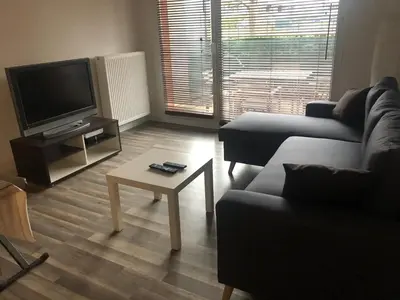 Télévision ou salle de divertissement dans l'établissement Résidence Le Parc 68