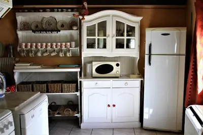 Cuisine ou kitchenette dans l'établissement Gite Loredana