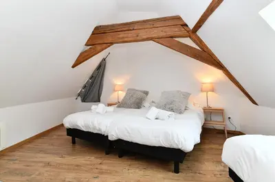 Un ou plusieurs lits dans un hébergement de l'établissement Gîte Le 1531
