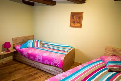 Un ou plusieurs lits dans un hébergement de l'établissement la petite maison