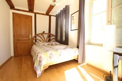 Un ou plusieurs lits dans un hébergement de l'établissement Colmar Historic Center - Alsacian Appartement PETITE VENISE 1 - BookingAlsace