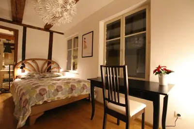 Un ou plusieurs lits dans un hébergement de l'établissement Colmar Historic Center - Alsacian Appartement PETITE VENISE 1 - BookingAlsace