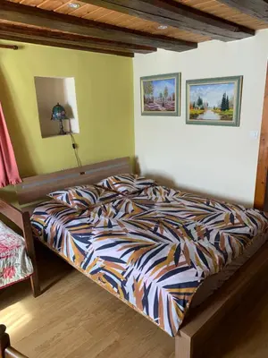 Un ou plusieurs lits dans un hébergement de l'établissement Appartement Style Rustique