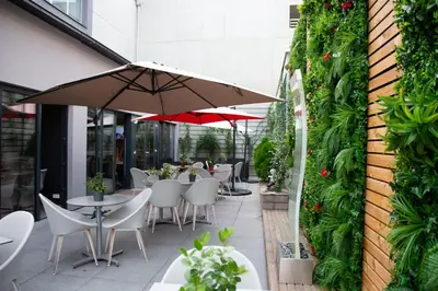 Restaurant ou autre lieu de restauration dans l'établissement Colmar Hotel