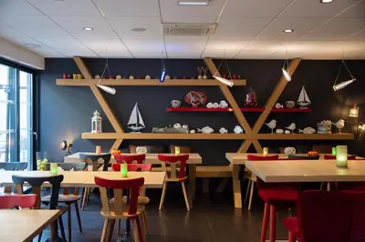 Restaurant ou autre lieu de restauration dans l'établissement Colmar Hotel