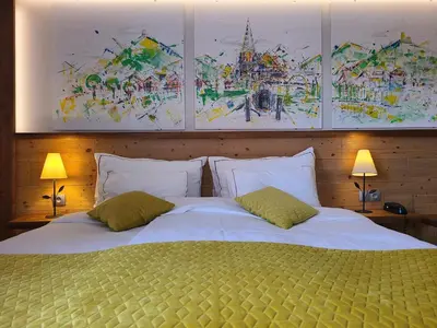 Un ou plusieurs lits dans un hébergement de l'établissement Auberge Ramstein Hôtel - Restaurant