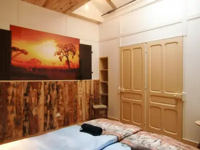 Un ou plusieurs lits dans un hébergement de l'établissement Chambre&Table d'hotes PtitMonde