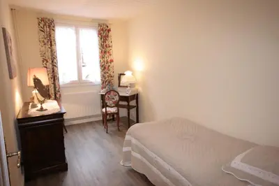 Un ou plusieurs lits dans un hébergement de l'établissement Appartement Jeanne