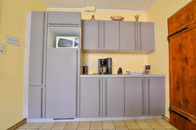 Cuisine ou kitchenette dans l'établissement Gite de la dime