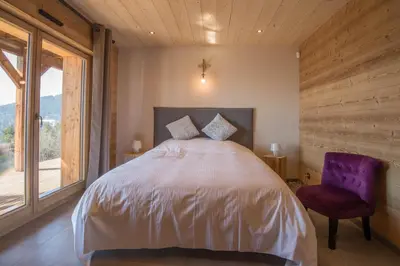 Un ou plusieurs lits dans un hébergement de l'établissement Les chalets perchés
