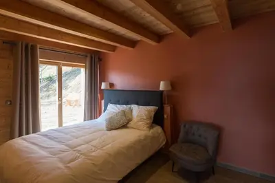 Un ou plusieurs lits dans un hébergement de l'établissement Les chalets perchés