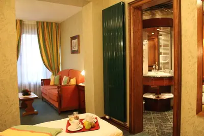 Un ou plusieurs lits dans un hébergement de l'établissement Hôtel Le Mittelwihr