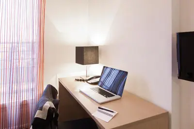 Télévision ou salle de divertissement dans l'établissement Aparthotel Adagio Access Saint Louis Bâle