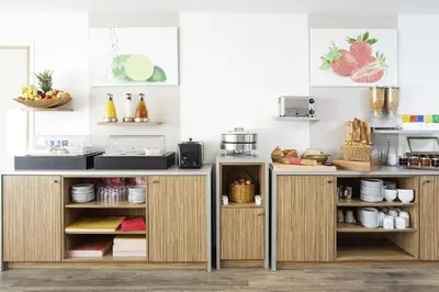 Cuisine ou kitchenette dans l'établissement Aparthotel Adagio Access Saint Louis Bâle