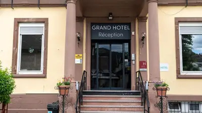 Façade ou entrée de l'établissement Brit Hotel Grand Hotel Munster
