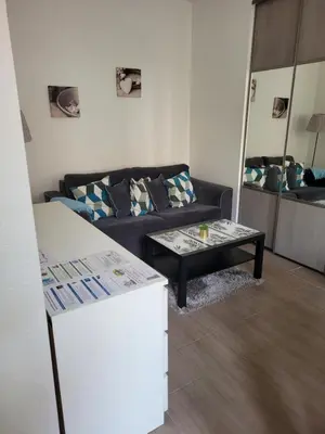 Coin salon dans l'établissement Tripiers Duplex