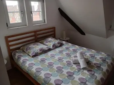 Un ou plusieurs lits dans un hébergement de l'établissement Colmar City Center - Cosy Appartement BED' N' BREDALA Max
