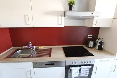 Cuisine ou kitchenette dans l'établissement Colmar City Center - Cosy Appartement BED' N' BREDALA Max