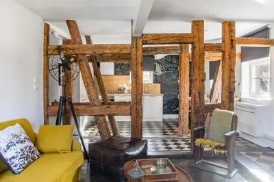 Coin salon dans l'établissement Reflets Sur La Lauch appartements