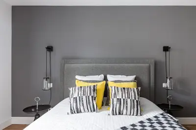 Un ou plusieurs lits dans un hébergement de l'établissement Reflets Sur La Lauch appartements
