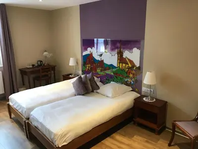 Un ou plusieurs lits dans un hébergement de l'établissement Auberge Le Meisenberg