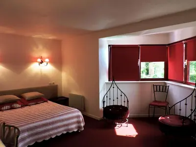 Un ou plusieurs lits dans un hébergement de l'établissement Hotel Restaurant Aux Sapins