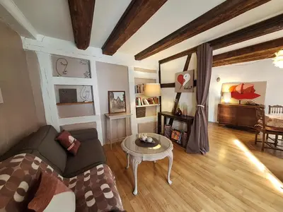 Coin salon dans l'établissement Maison Cliquot - Appartements Colmar Centre