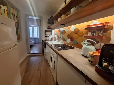 Cuisine ou kitchenette dans l'établissement Maison Cliquot - Appartements Colmar Centre