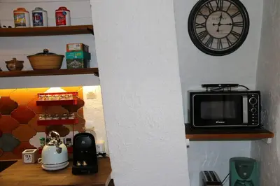 Cuisine ou kitchenette dans l'établissement Maison Cliquot - Appartements Colmar Centre