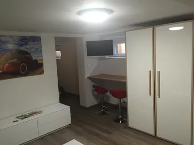 Télévision ou salle de divertissement dans l'établissement Le Clos du Silberthal