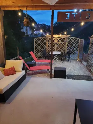 Coin salon dans l'établissement Le Nid Du Caveau